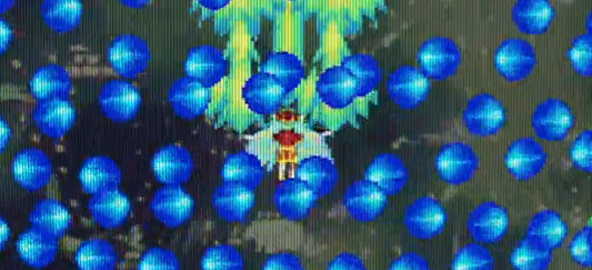A screenshot on the last pattern of the last boss in Espgaluda